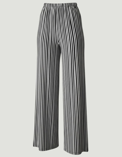 Pantalones de pernera ancha A F R A A T E L I E R con rayas verticales en chocolate y beige, tejido fluido.