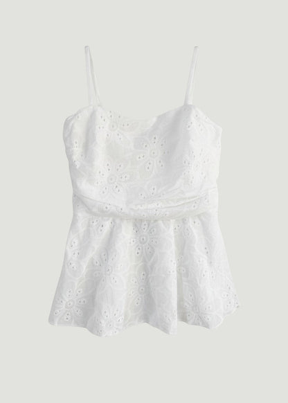 Top blanco tipo corsé peplum de A F R A A T E L I E R en algodón con encaje bordado de motivos florales